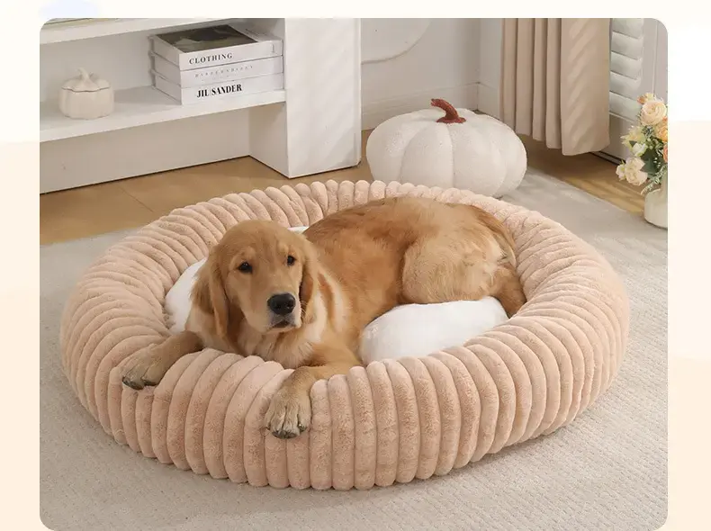 Apricot ribbed round bolster pet bed with dog