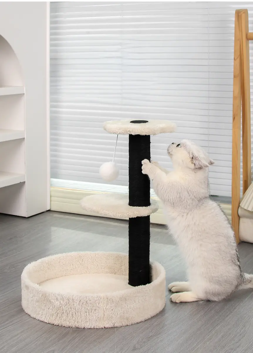 Cat using three-tier scratching tree